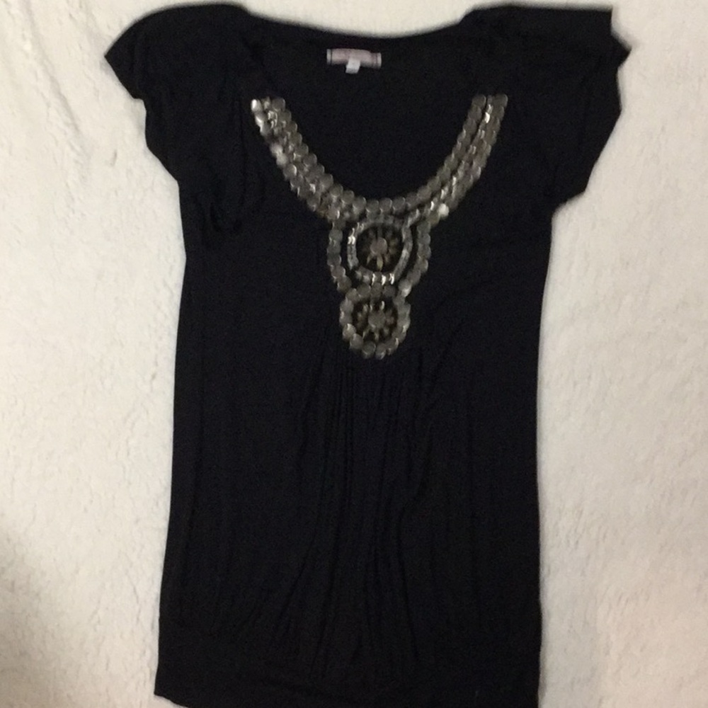 Designer Lady’s top; size small.
